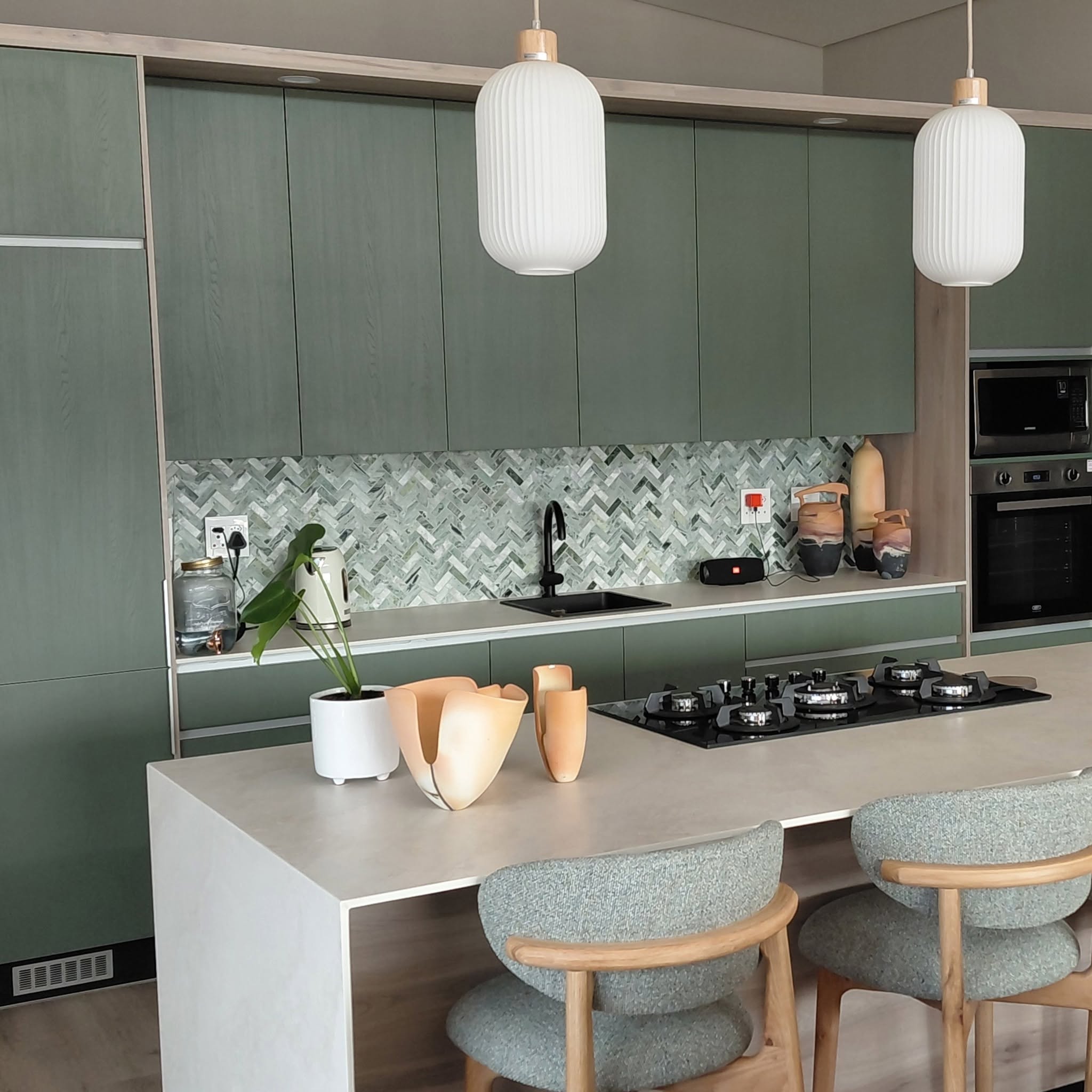 Contemporary RJL kitchen with refined cabinetry